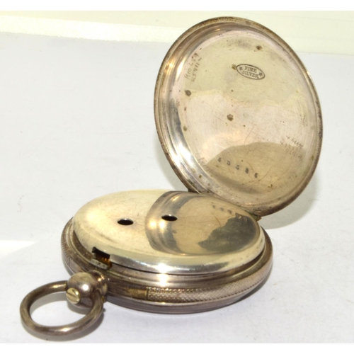 346 - Silver pocket watch and key with white face and Roman numerals and subsidiary dial seen working when... 