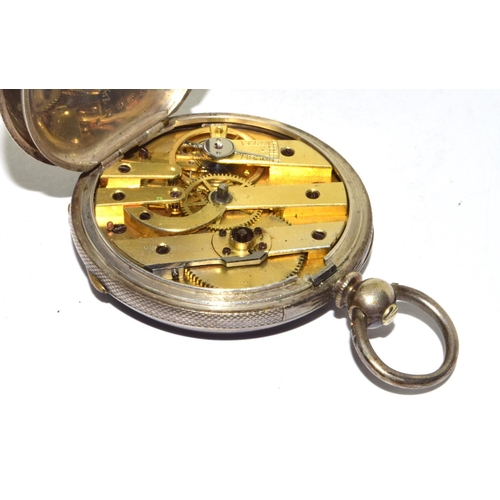 346 - Silver pocket watch and key with white face and Roman numerals and subsidiary dial seen working when... 