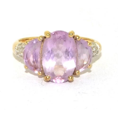 197 - 9ct gold vintage Diamond and Amethyst ring in a stepped setting 3.6g size Q