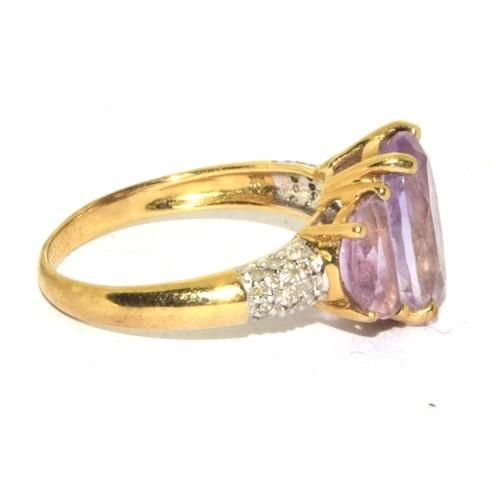 197 - 9ct gold vintage Diamond and Amethyst ring in a stepped setting 3.6g size Q