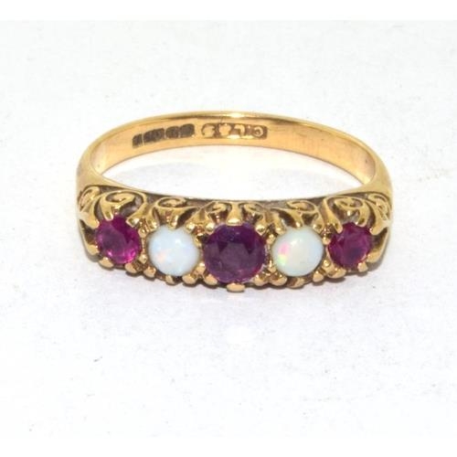 200 - 9ct gold vintage Opal and Garnet ring in a scroll setting size M