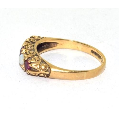 200 - 9ct gold vintage Opal and Garnet ring in a scroll setting size M