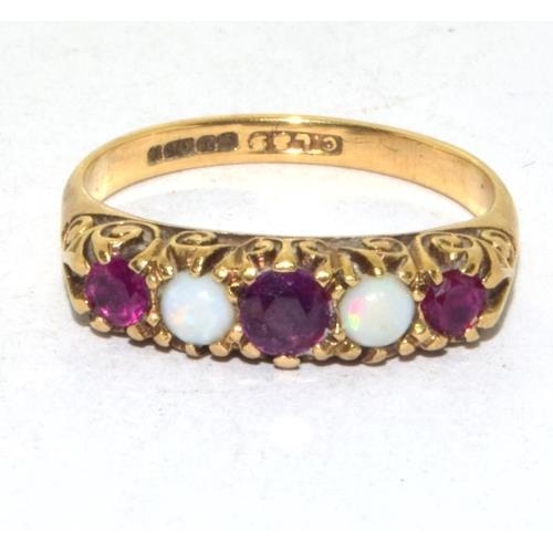 200 - 9ct gold vintage Opal and Garnet ring in a scroll setting size M