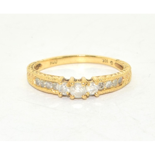 211 - 9ct gold ladies Diamond set ring with trifold Diamonds and diamonds to the shank approx 40 points si... 