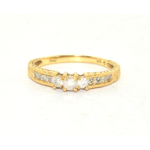 211 - 9ct gold ladies Diamond set ring with trifold Diamonds and diamonds to the shank approx 40 points si... 