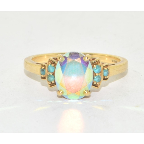 212 - 9ct gold ladies Mystic Topaz and Emerald ring size N