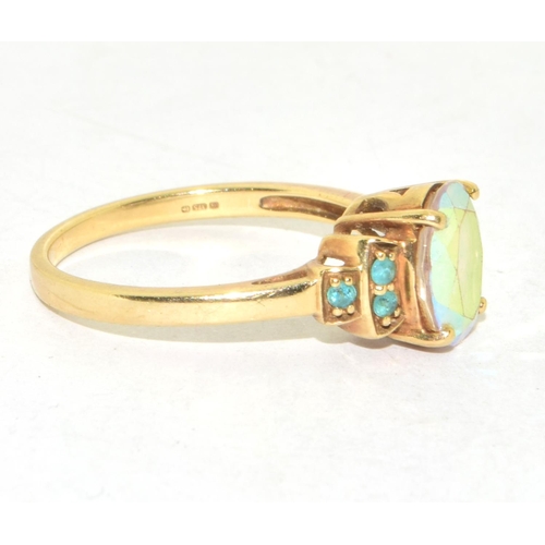 212 - 9ct gold ladies Mystic Topaz and Emerald ring size N