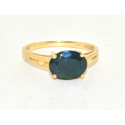 214 - 9ct gold ladies contemporary green  Diopside  solitaire ring on a twin shank with claw setting size ... 