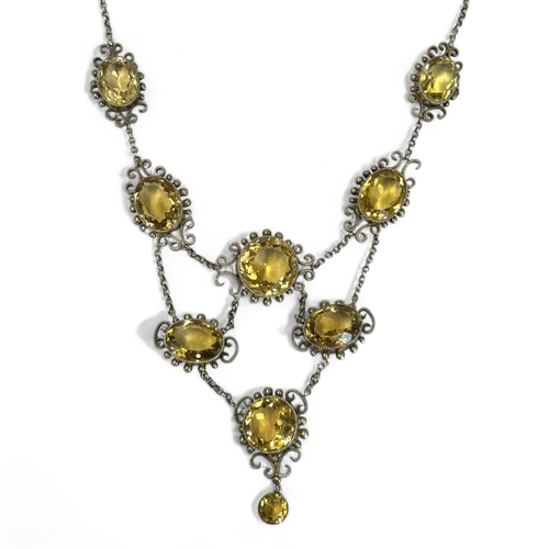 287 - Ladies antique large Citrine necklace.Set with nine large oval & round cut Citrines.