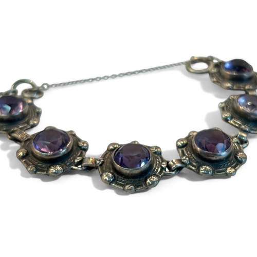 291 - A sterling silver & Amethyst bracelet.