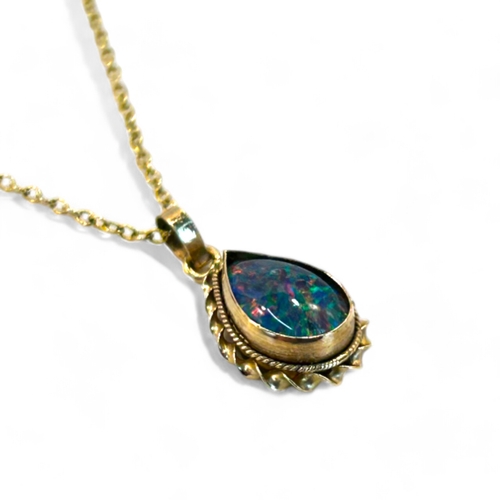 312 - A 9ct Gold & Australian black Opal pendant necklace.