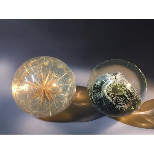 69 - Caithness Paperweight North Sea Ltd edition 279/1000 and a Lucite Paperweight.