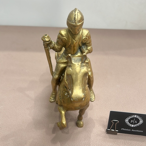 65 - Vintage brass knight on horseback figurine featuring intricate detail. Removable knight adds a dynam... 