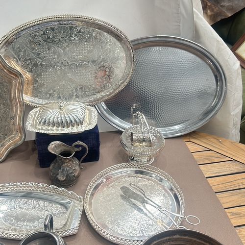 73 - Collection of assorted silver-plated serving trays and accessories, including an ornately engraved b... 