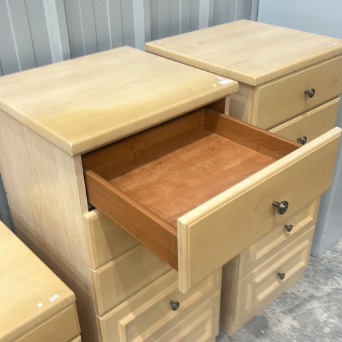 82 - Set of light wood bedroom furniture includes a Tv Cabinet, two bedside cabinets, and two chest of dr... 