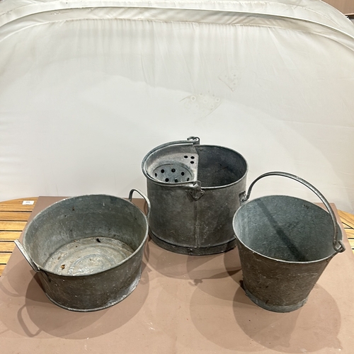 88 - Set of three vintage galvanized metal buckets, including one with a divided section and perforated i... 