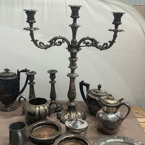 90 - Collection of various antique silver-plated items including candlesticks, a candelabra, tea pots, bo... 