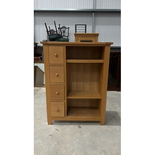 63 - A modern Con-tempo oak cabinet/ Bookshelf featuring 4 drawers and open shelves