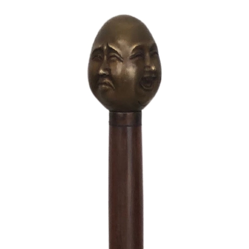 34 - Metal topped Budda walking stick ref  65