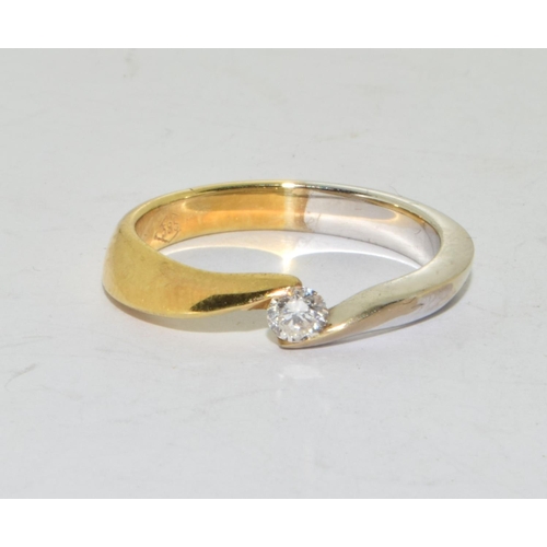 502 - A 14ct white and yellow Gold & Diamond solitaire ring.Size - NWeight - 3.39