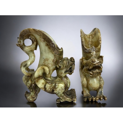 136 - A pair of Chinese carved hardstone Pixiu figures.Height - 20cm