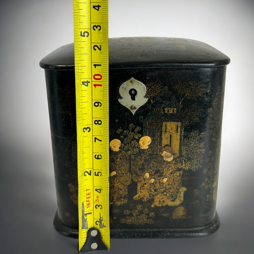 137 - A Victorian Papier-mache 'Chinoiserie' decorated tea caddy.Height - 11cm