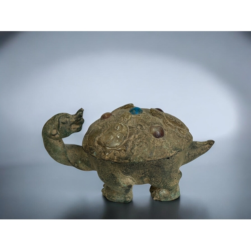 142 - A Chinese Archaistic Bronze Turtle (Pinyin). Relief young to shell inset with various cabochon.Lengt... 