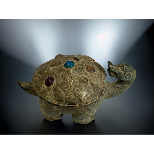 142 - A Chinese Archaistic Bronze Turtle (Pinyin). Relief young to shell inset with various cabochon.Lengt... 