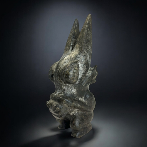 143 - A Chinese carved hardstone figure of a mythical beast. In the Hongshan style.Height -