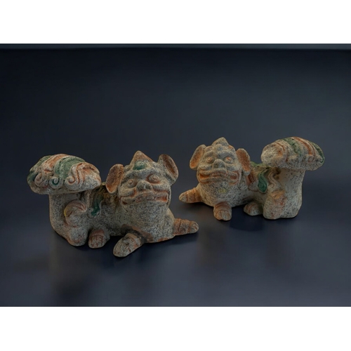 144 - A pair of Chinese Buddhistic Lions, together with a pair of funerary type horses. In the Tang style.... 