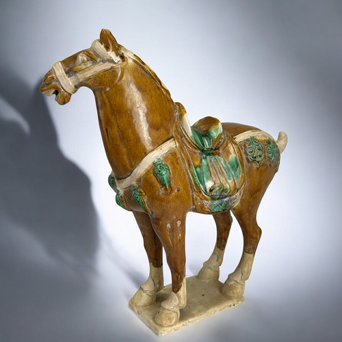 146 - A Chinese Tang style horse.Sancai glaze.Height- 30cm