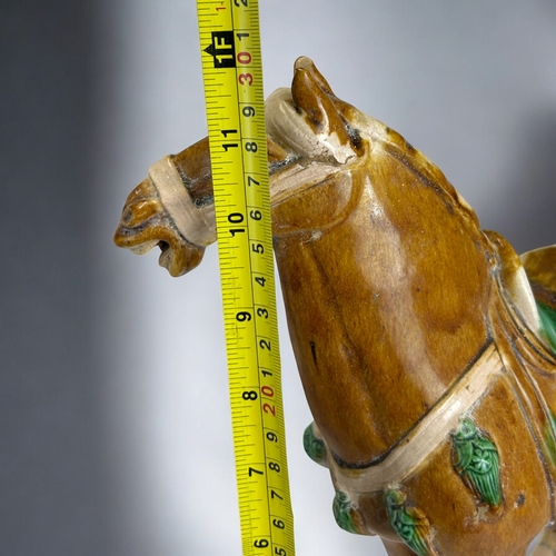 146 - A Chinese Tang style horse.Sancai glaze.Height- 30cm