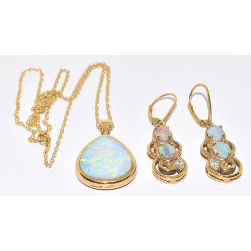 5 - 9ct gold Opal and Diamond  pendant necklace and Earrings suite of jewellery set on a 44cm gold chain... 