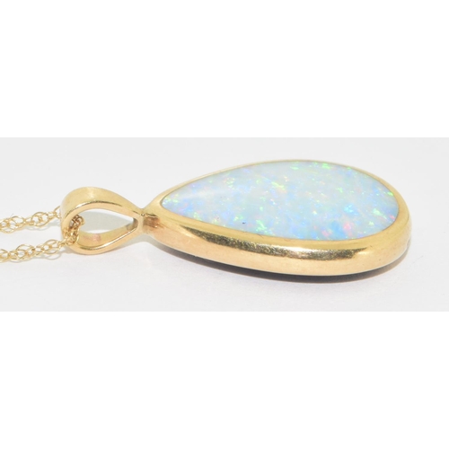 5 - 9ct gold Opal and Diamond  pendant necklace and Earrings suite of jewellery set on a 44cm gold chain... 