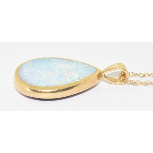 5 - 9ct gold Opal and Diamond  pendant necklace and Earrings suite of jewellery set on a 44cm gold chain... 