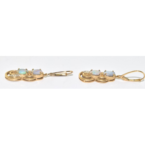 5 - 9ct gold Opal and Diamond  pendant necklace and Earrings suite of jewellery set on a 44cm gold chain... 