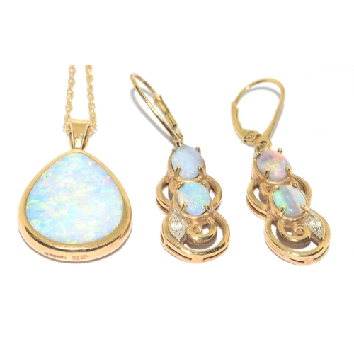 5 - 9ct gold Opal and Diamond  pendant necklace and Earrings suite of jewellery set on a 44cm gold chain... 