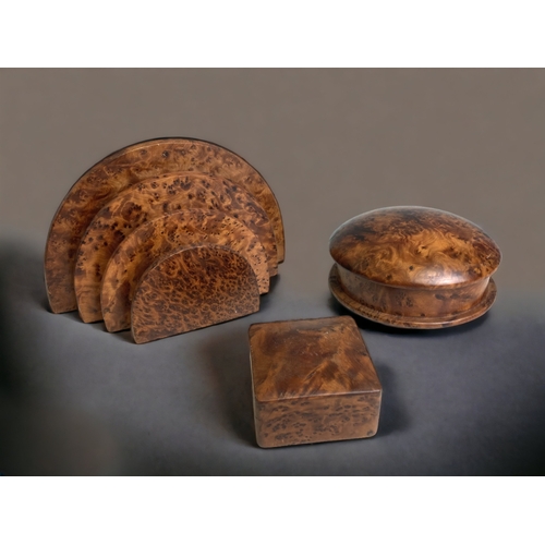 307 - A MOROCCAN THUYA WOOD LETTER RACK, TOGETHER WITH TWO LIDDED BOXES.