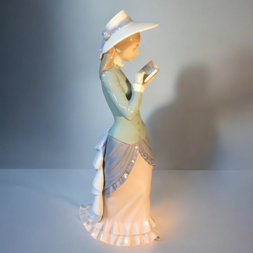 105 - Lladro Figurines x 2 - Model No's 6236 Lady of Monaco, 5000 Lady Reading.