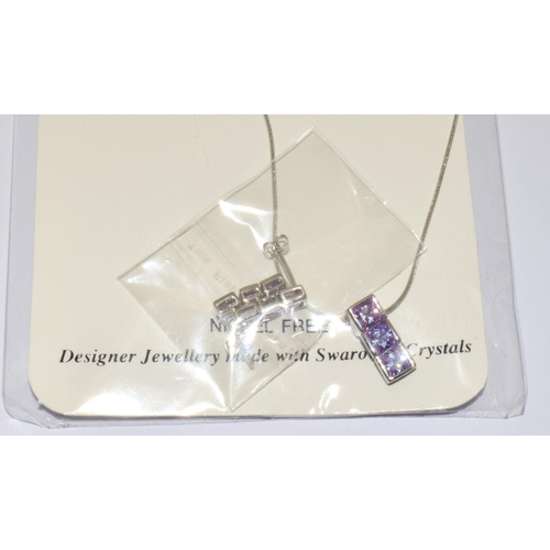 332 - 4 x New with Tags Swarovski necklaces and matching earrings hallmarked 925 silver average sale price... 