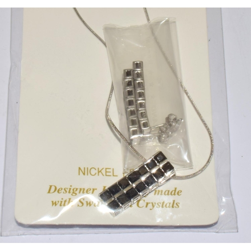 332 - 4 x New with Tags Swarovski necklaces and matching earrings hallmarked 925 silver average sale price... 