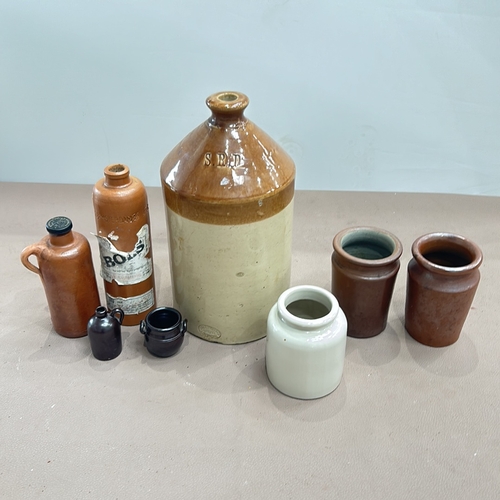 340 - Collection of early 20th-century pottery bottles and jars, including a Bols stoneware bottle, variou... 