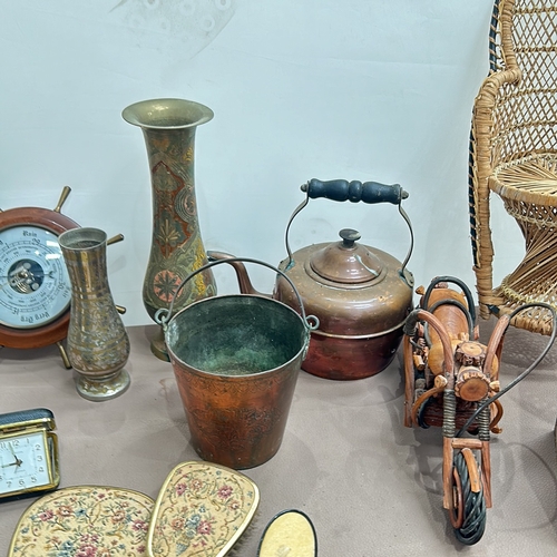 344 - Mixed lot featuring a rustic wooden motorcycle sculpture, copper kettle, vintage barometers, rattan ... 