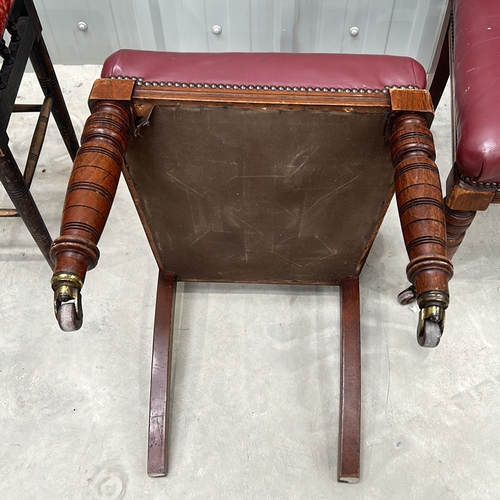 272 - Victorian-style mahogany chairs, set of two, feature red leather upholstery and decorative carving. ... 