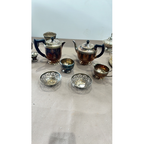 281 - Collection of six electroplated items by Viners and others, England. Includes goblets, salt and pepp... 