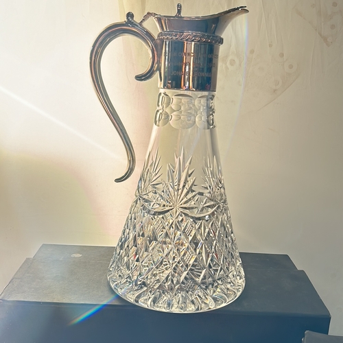 291 - Mappin & Webb crystal claret jug with engraved silver style detailing, paired with a commemorati... 