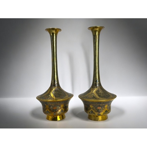 150 - A fine pair of Islamic Cairoware mixed metal vases.19th century.Height -