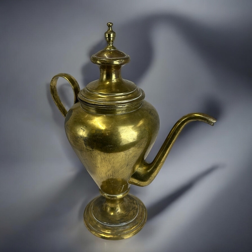 152 - A large 19th century brass coffee / tea pot. Together with brass water jug. Tallest - 37cm