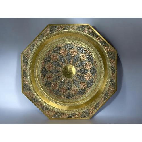 154 - Indo-Persian mixed metal octagonal tray.Concentric foliate & birds pattern.