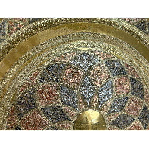 154 - Indo-Persian mixed metal octagonal tray.Concentric foliate & birds pattern.